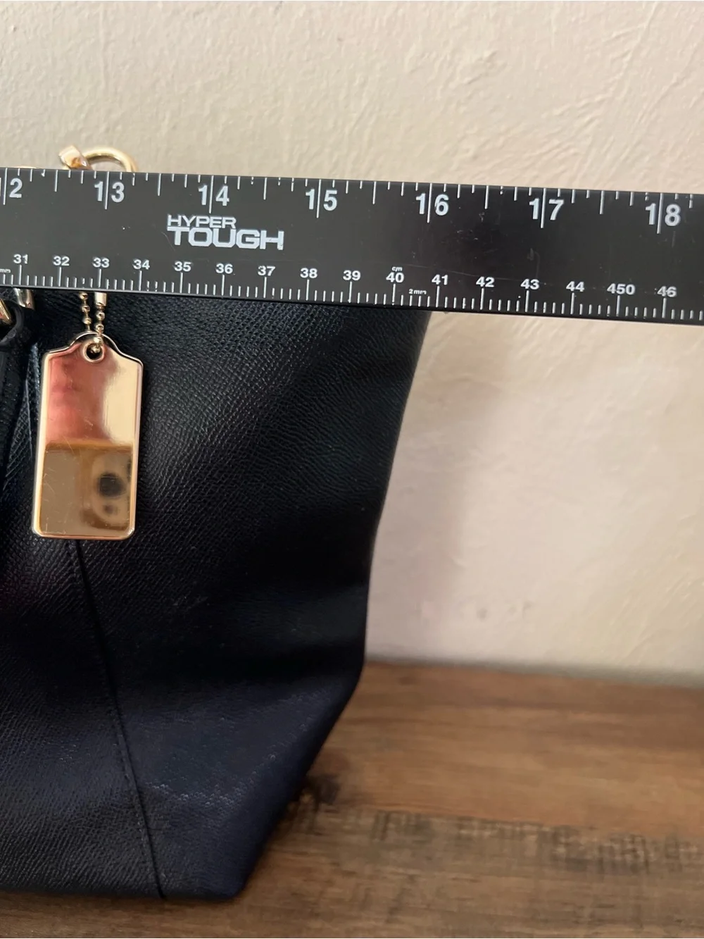 Coach sleek leather